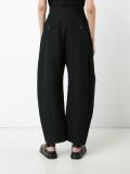 curved leg trousers 