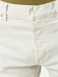 distressed slim jeans
