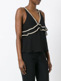 vest with contrast colour neck and frill detail