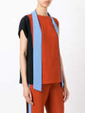 asymmetric tie-fastening tank