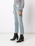 distressed slim jeans