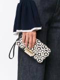flower embellished clutch