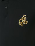 embroidered patch polo shirt