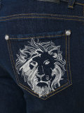 lion head skinny jeans 