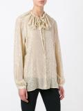 ruffled neck shirt