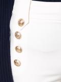 button detailing flared trousers