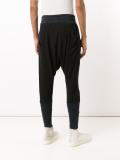 drop-crotch track pants