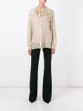 ruffled neck shirt