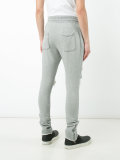 distressed track pants