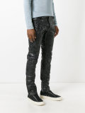 coated effect trousers