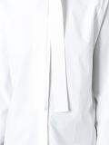 tied neck shirt