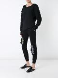 distressed track pants