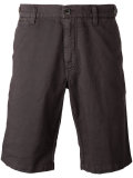 shorts with button closure flap pockets