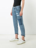 patch and frayed jeans
