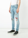distressed skinny jeans