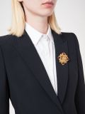 logo gripoix brooch