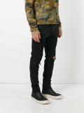 distressed coated jeans 