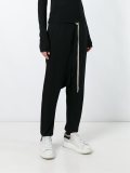drop-crotch track pants