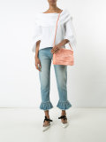 distressed shoulder bag