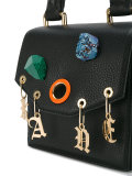 charm embellished cross body bag
