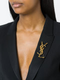 logo brooch
