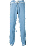 loose-fit frayed jeans
