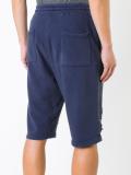 distressed track shorts