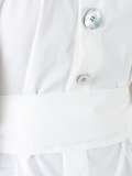 back button fastening shirt