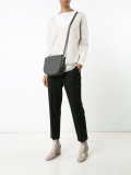 asymmetric closure crossbody bag