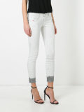 splatter skinny jeans 