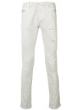 distressed slim jeans