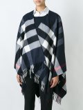 checked fringed poncho