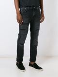 distressed slim-fit jeans