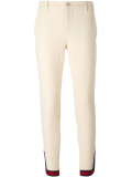 Web zipped cuff trousers