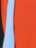 asymmetric tie-fastening tank