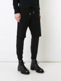 layered track pants 