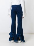 flared pleated jeans