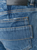 creased effect tapered jeans