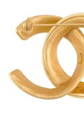 logo brooch
