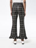 checked ruffle hem trousers