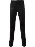 distressed coated jeans 