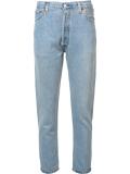 high-rise cropped 'Destruction' jeans