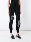distressed track pants