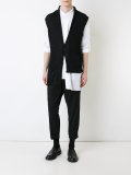 asymmetric knitted gilet