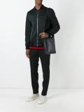logo embossed messenger bag