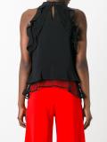 ruffled sleeveless blouse