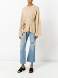 loose-fit belted jumper