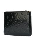 polka dot embossed clutch