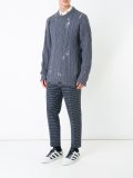 distressed cable knit jumper