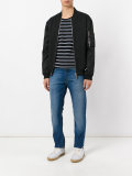 stonewashed slim-fit jeans